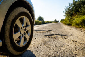 Who Is Liable for a Car Accident Caused by Bad Road Conditions?