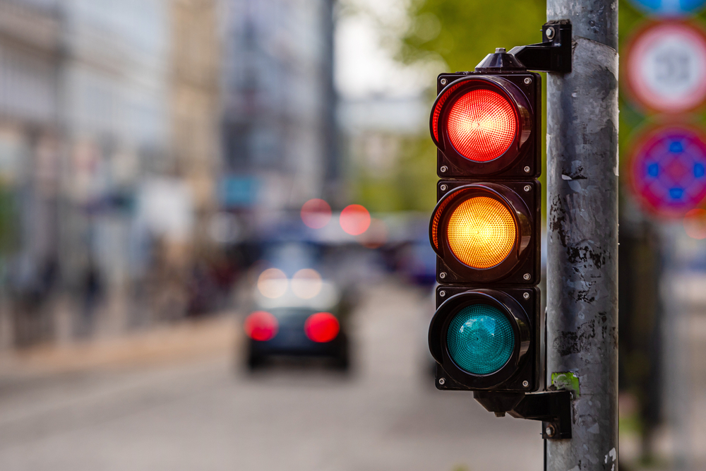 City traffic light. What to do after a pedestrian accident.