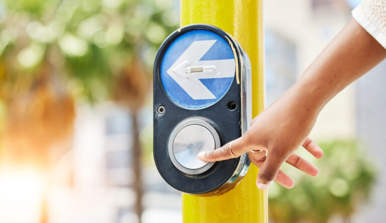 Crosswalk button for a traffic light where a crash occurred, leaving the victim to wonder about the 3 mistakes to avoid after a pedestrian accident.