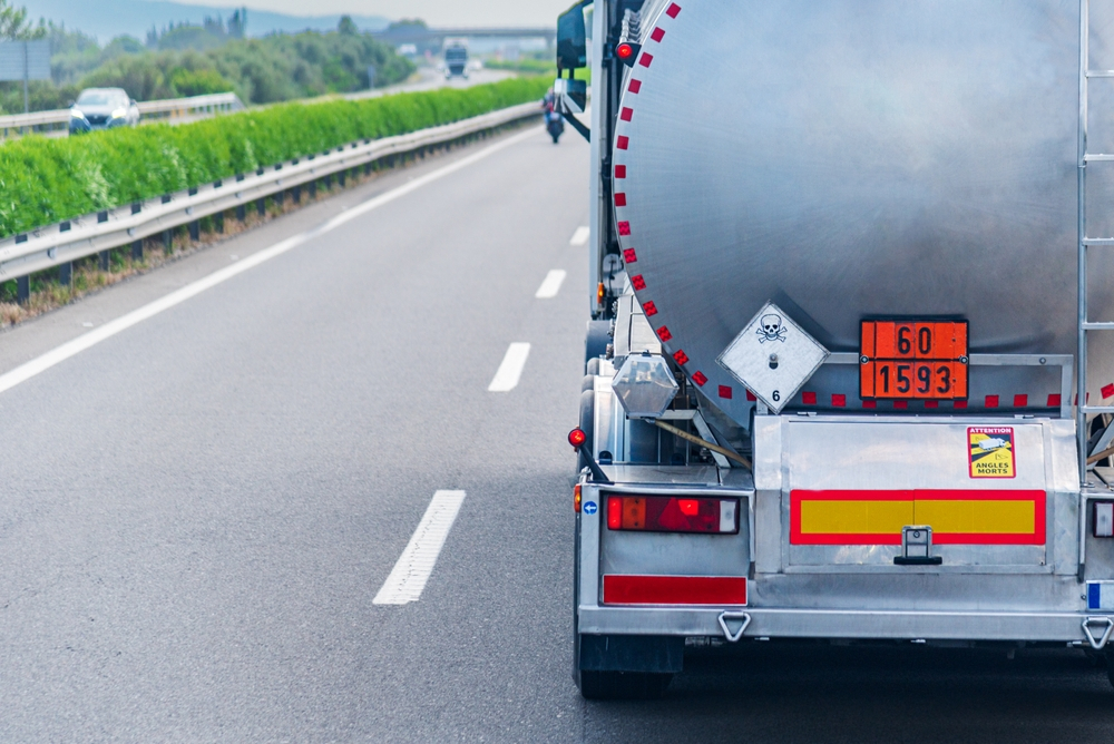 Hazardous materials tanker truck on the road