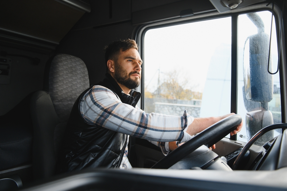 A truck driver looking at the road. What is engine braking in truck accident cases?